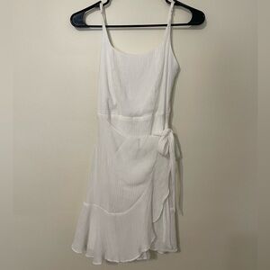 3/$15 ❤️ White Ruffled Asymmetrical Wrap Dress
